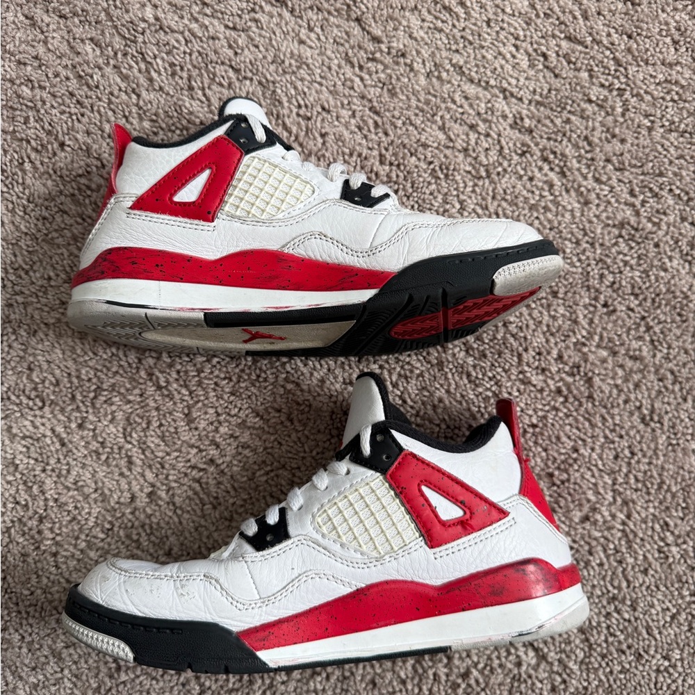Nike Air Jordan 4 Retro sneakers in the "Red Cement"